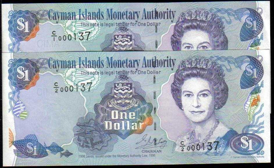 <font color=red><b>Cayman Islands Pick 21a and Pick 21b, UNC <p></font></b> $1, 1998 date.  Matching Serial numbers.  Two notes both with Serial #000138, one is Prefix C/1, the other; Prefix C/2.  Very unique and interesting matching numbers.   <p> <a href="/shop/catalog/images/Cayman-Pick-21ab-000138.jpg">   <font color=green><b>View the image</b></a></font>
